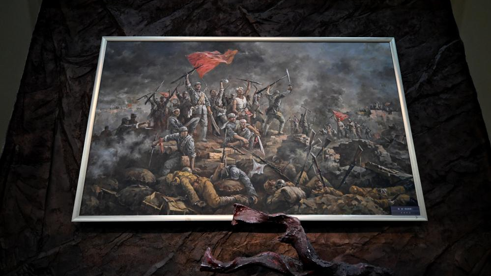 Une peinture à l'huile exposée au Memorial Hall commémorant la campagne des centaines de régimes à Yangquan, la province du Shanxi du nord de la Chine, 7 juillet 2025. / Xinhua
