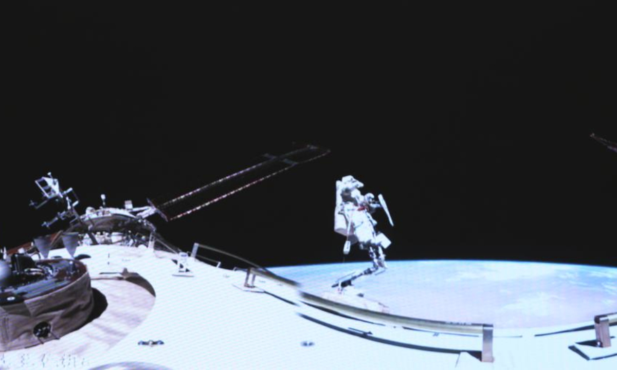 This screen image captured at Beijing Aerospace Control Center on Aug. 15, 2025 shows Shenzhou-20 astronaut Chen Dong performing extravehicular activities outside China