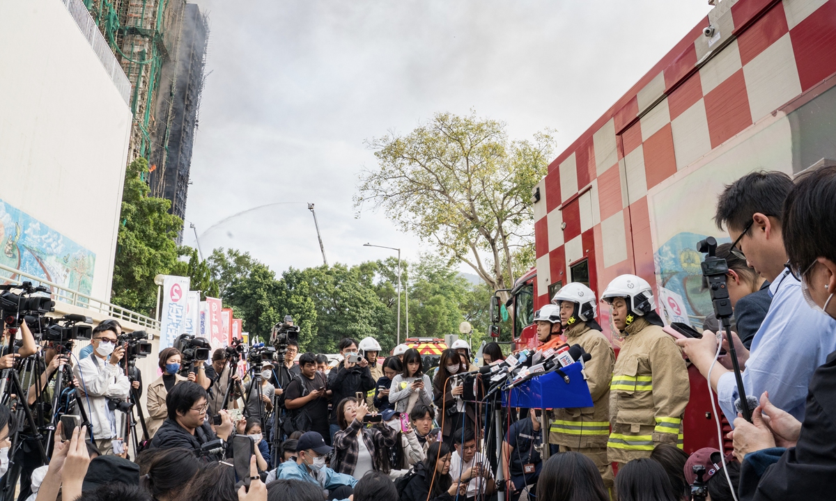 Hong Kong Fire Services and rescue officials brief the media on the latest progress at the scene of the Tai Po Hung Fuk Court fire on November 27, 2025, Hong Kong Special Administrative Region, China. Photo: VCG