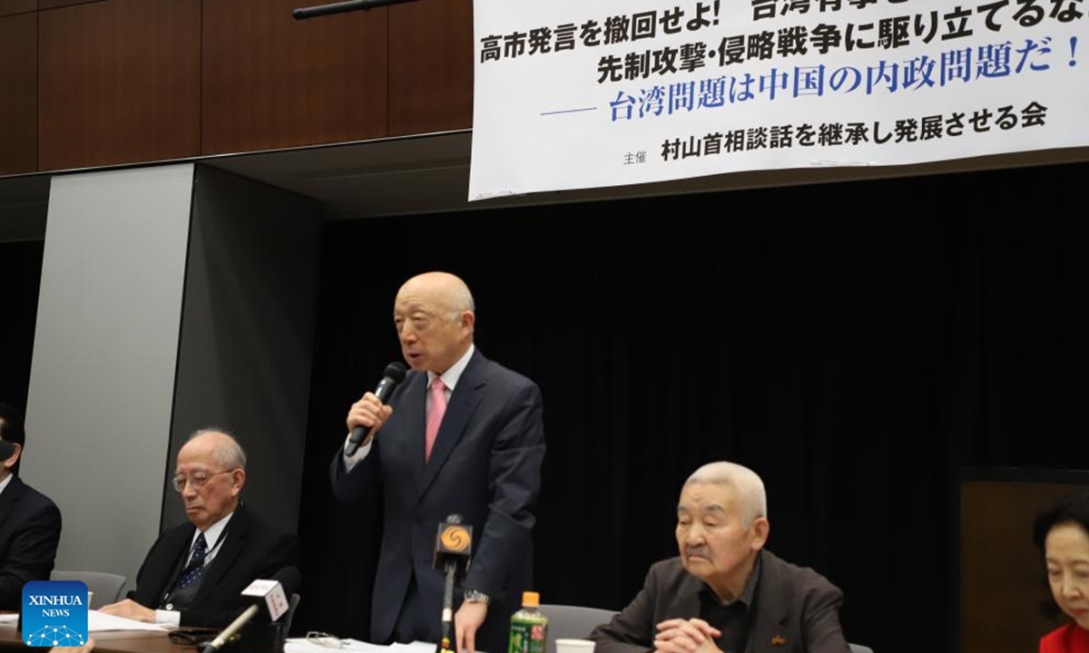 Takakage Fujita, the secretary-general of the Association for Inheriting and Propagating the Murayama Statement, reads out a statement demanding Takaichi withdraw her comments at a press conference in Tokyo, Japan, December 8, 2025. Photo: Xinhua