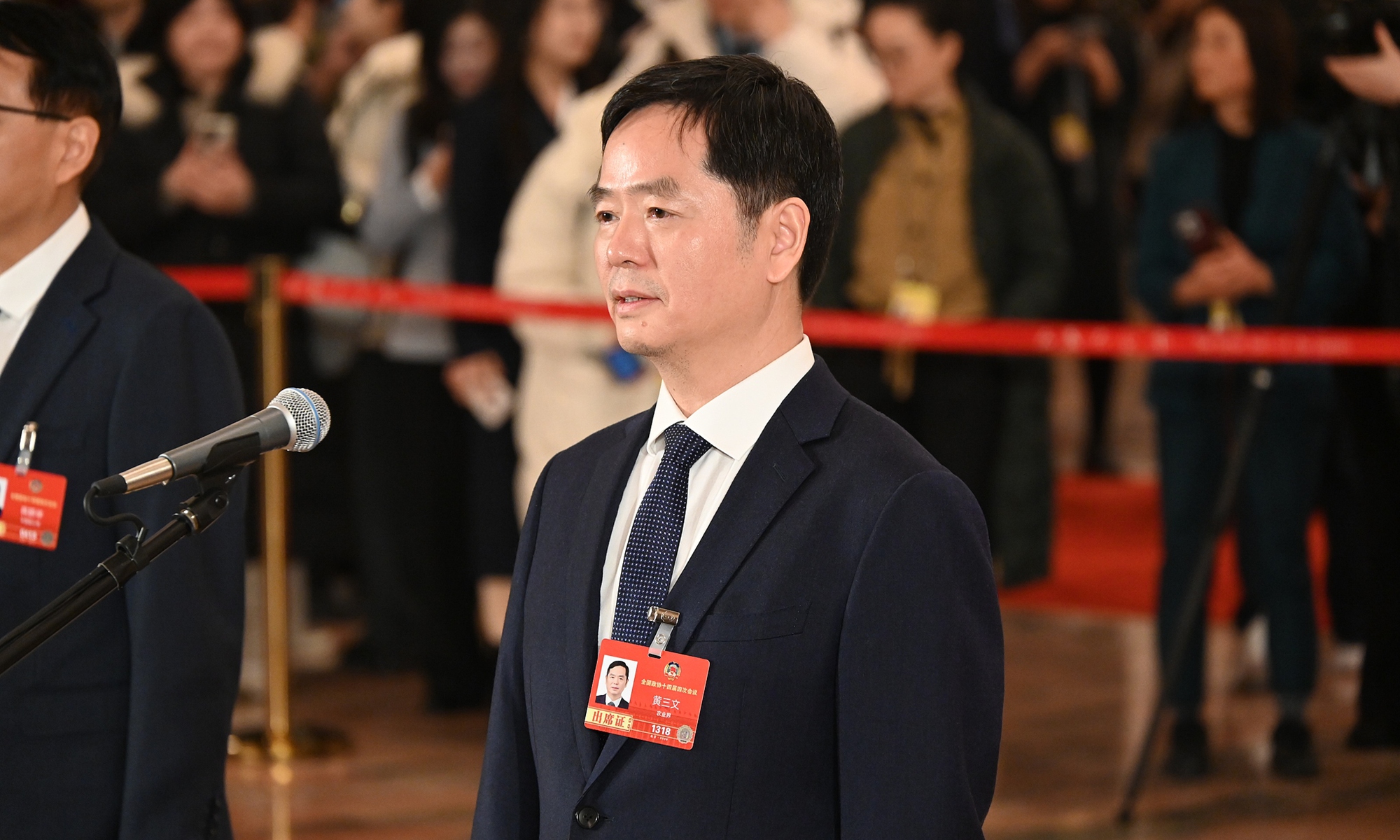 Huang Sanwen, a member of the 14th National Committee of the Chinese People