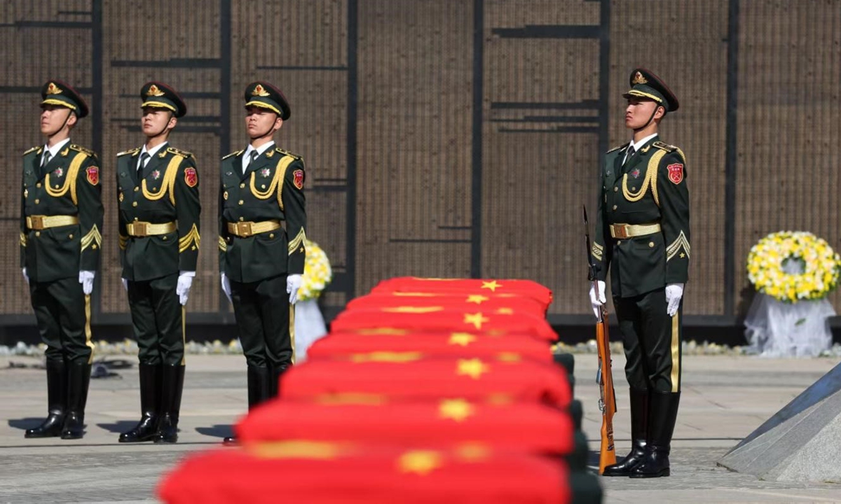 A burial ceremony for the remains of the 13th batch of Chinese People