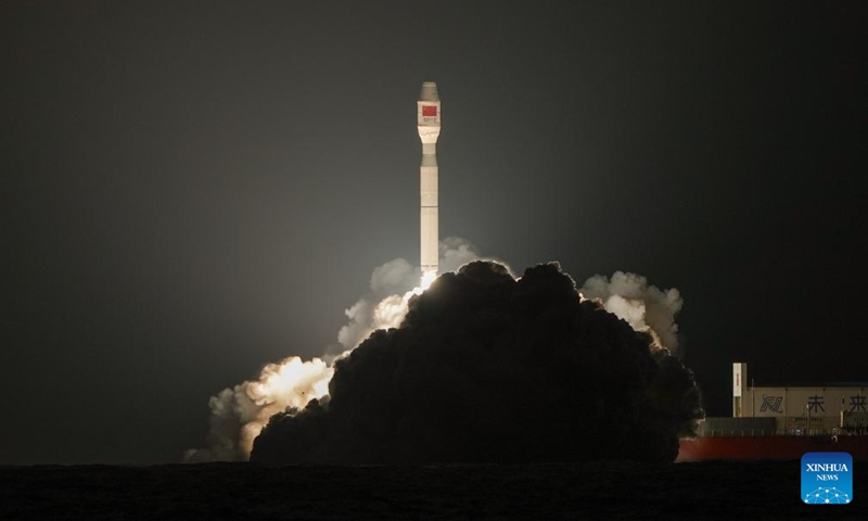 A Smart Dragon-3 (SD-3) carrier rocket carrying a test satellite blasts off from waters off the coast of Yangjiang in south China