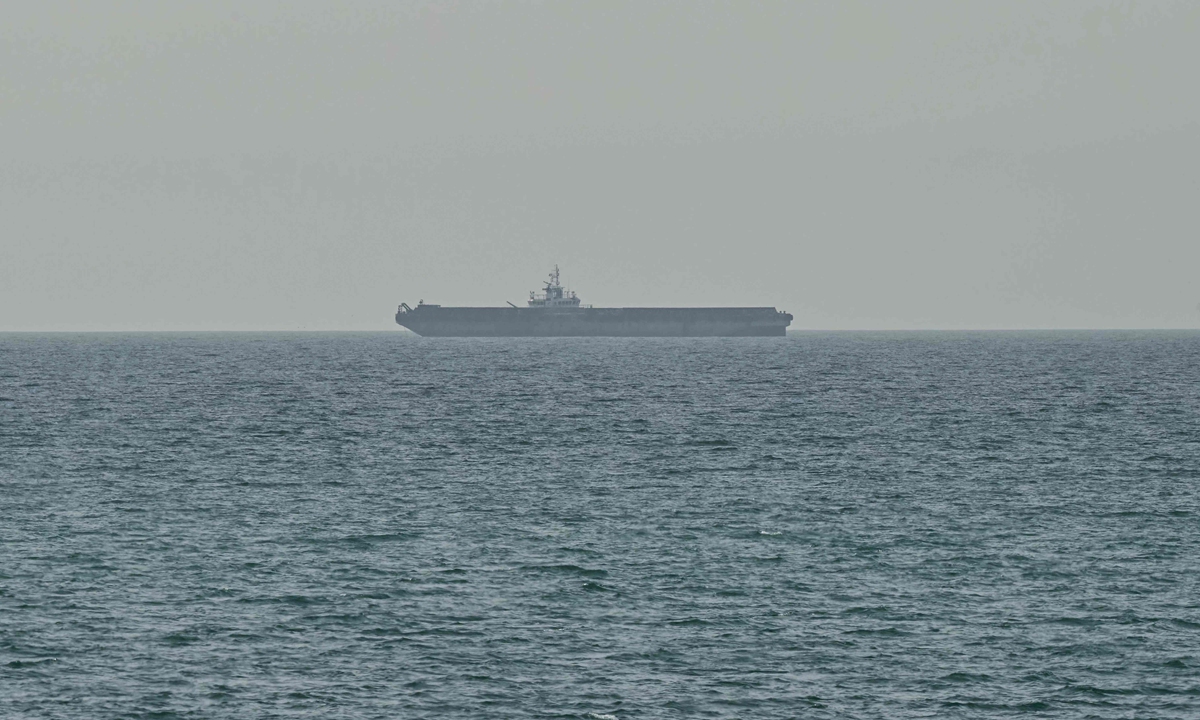 A ship is seen off the coast of Ras al-Khaimah, United Arab Emirates, the day after the failure of US-Iran peace talks on April 13, 2026. Photo: VCG