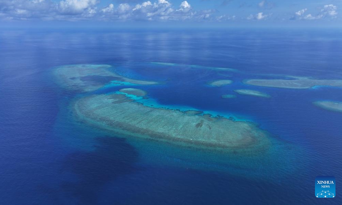 This photo carried in a report named A Survey Report on the Coral Reef Ecosystem of Xianbin Jiao shows an aerial view of Xianbin Jiao of China