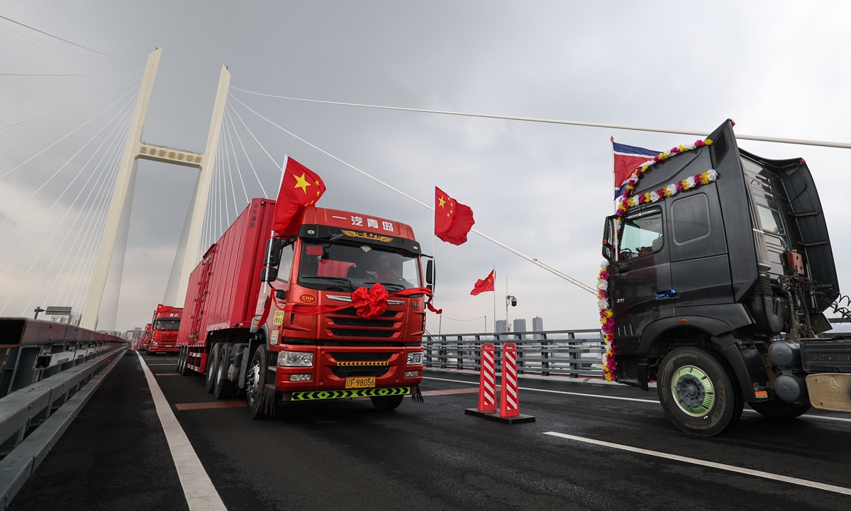 This photo taken on October15, 2026 shows trucks running on the new China-DPRK Yalu River bridge. The new China-DPRK Yalu River bridge officially opened to traffic on Thursday, with both sides jointly holding an opening ceremony on this cross-border artery. Photo: Xinhua